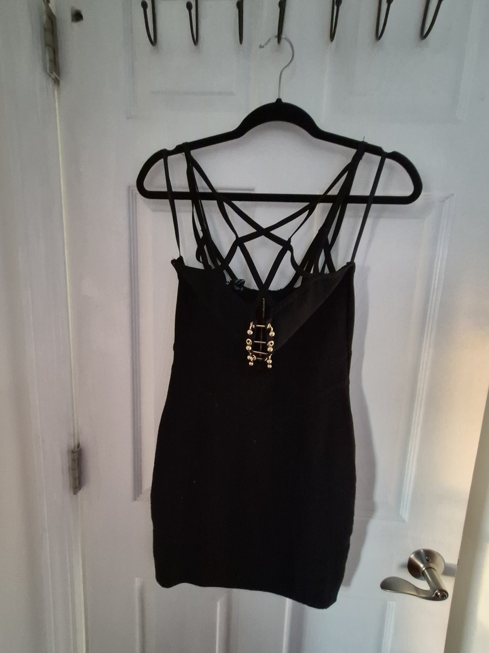 bebe Black Strappy Mini Dress with Gold Accent